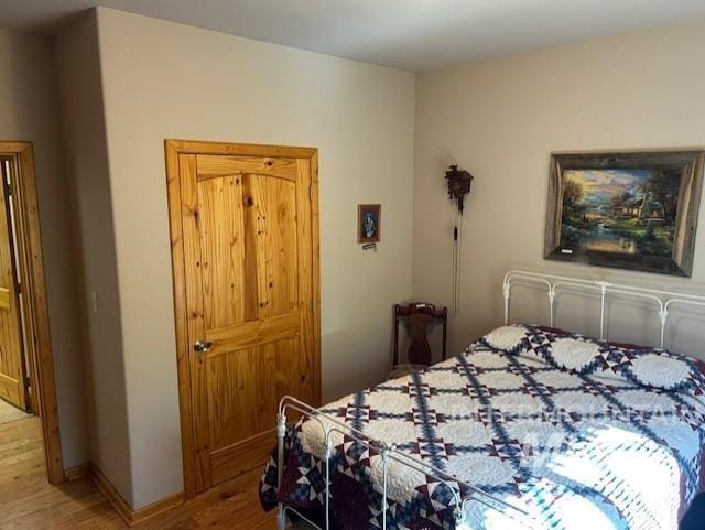 1621 Doumecq Rd, Cottonwood, ID 83522 - bedroom featuring wood finished floors and baseboards