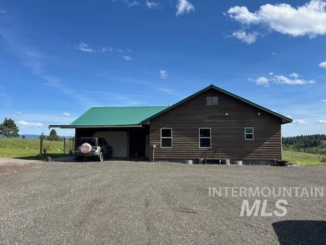1621 Doumecq Rd, Cottonwood, ID 83522 - view of side of home with driveway
