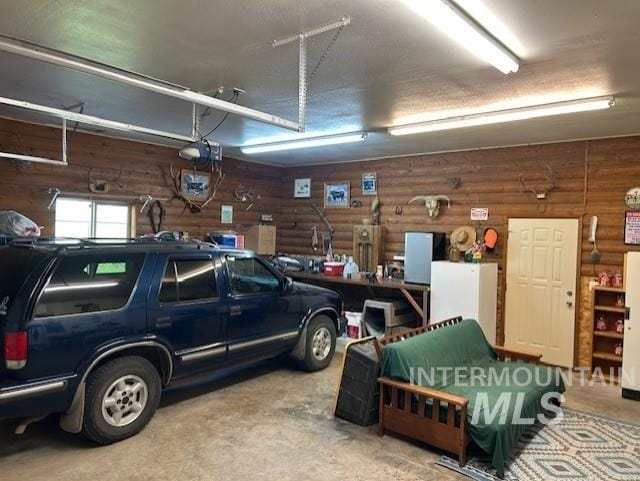 1621 Doumecq Rd, Cottonwood, ID 83522 - garage featuring a garage door opener