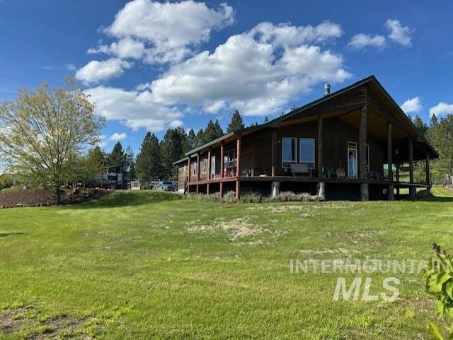 1621 Doumecq Rd, Cottonwood, ID 83522 - rear view of property featuring a lawn