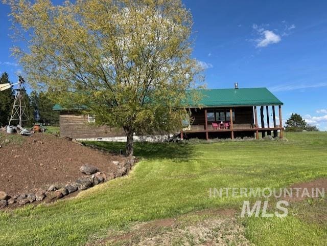 1621 Doumecq Rd, Cottonwood, ID 83522 - rear view of house with a lawn