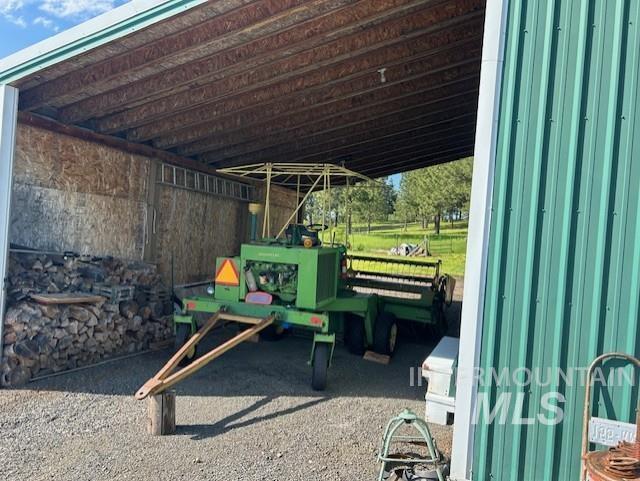 1621 Doumecq Rd, Cottonwood, ID 83522 - view of patio featuring an attached carport