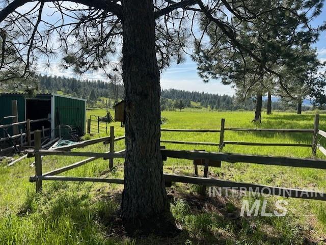 1621 Doumecq Rd, Cottonwood, ID 83522 - view of yard with an outdoor structure and a view of rural / pastoral area