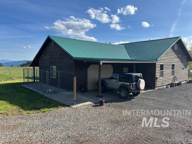 1621 Doumecq Rd, Cottonwood, ID 83522 - view of side of property featuring metal roof
