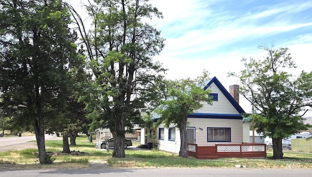 495 1st St E, Huntington, OR 97907 - view of home's exterior featuring a chimney