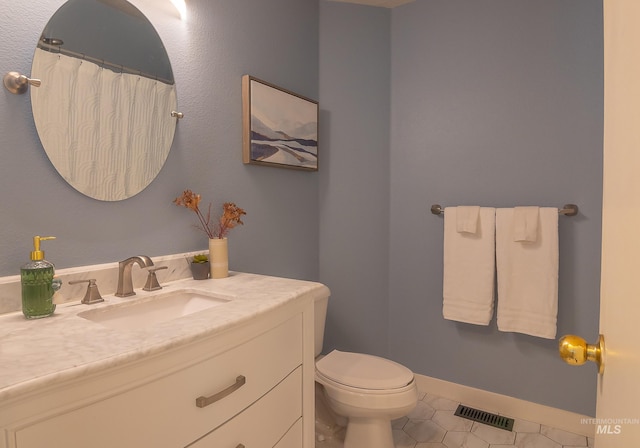 full bath featuring visible vents, tile patterned flooring, vanity, and toilet