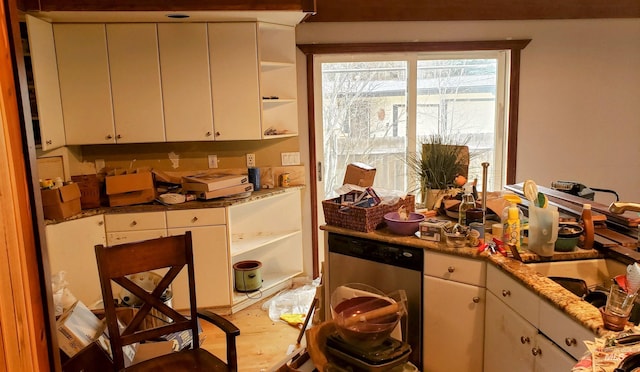 kitchen with dishwasher, open shelves, white cabinets, and light stone counters