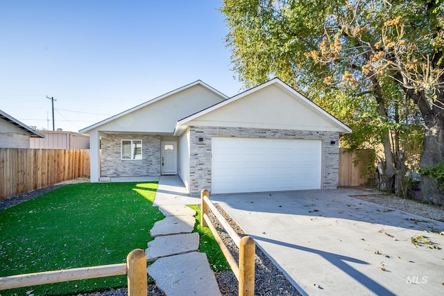 ranch-style house featuring a garage and a front yard