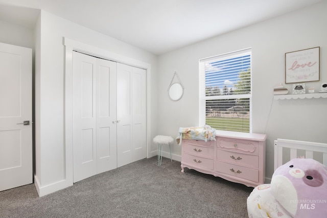 bedroom featuring carpet flooring, a closet, and baseboards