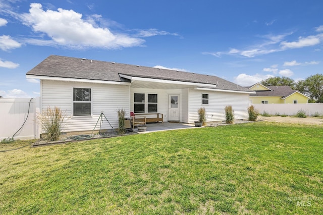 back of house with a patio