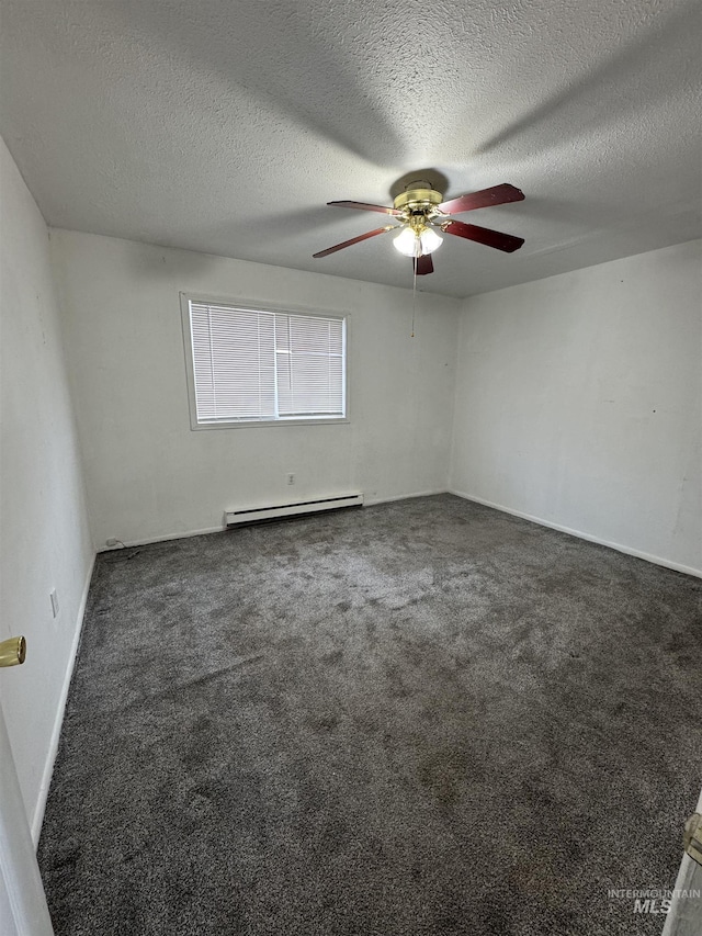 1850 18th Circle Dr, Heyburn, ID 83336 - unfurnished room featuring a baseboard heating unit, ceiling fan, carpet floors, and a textured ceiling
