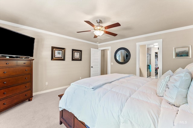 bedroom featuring light colored carpet, crown molding, baseboards, and ceiling fan