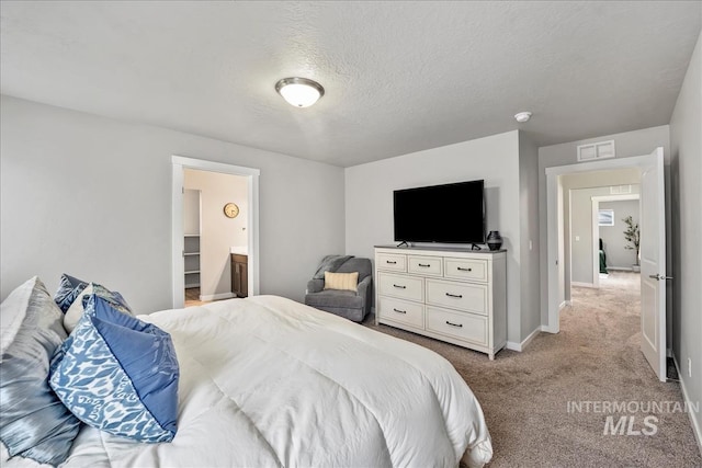 4084 E Esperanto St, Meridian, ID 83642 - bedroom featuring light carpet, visible vents, baseboards, and a textured ceiling