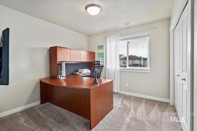 4084 E Esperanto St, Meridian, ID 83642 - carpeted home office featuring baseboards and a textured ceiling