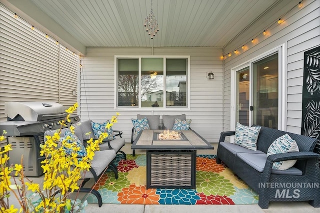 4084 E Esperanto St, Meridian, ID 83642 - view of patio featuring an outdoor living space with a fire pit and area for grilling