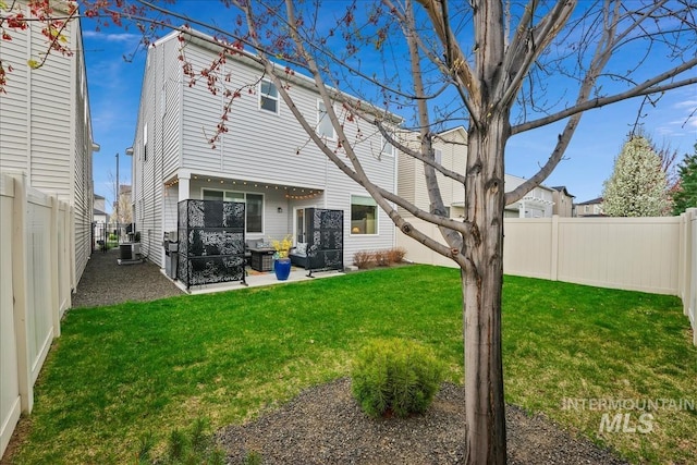 4084 E Esperanto St, Meridian, ID 83642 - rear view of property with cooling unit, a yard, a patio area, and a fenced backyard