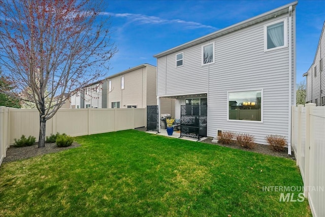 4084 E Esperanto St, Meridian, ID 83642 - rear view of house with a yard and a fenced backyard