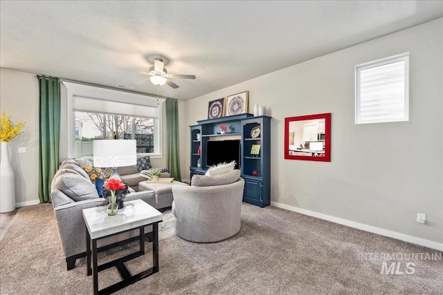 4084 E Esperanto St, Meridian, ID 83642 - living room featuring carpet flooring, ceiling fan, and baseboards