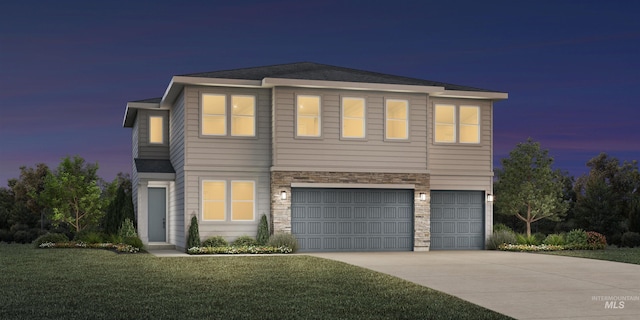 view of front of property featuring a garage, stone siding, driveway, and a lawn