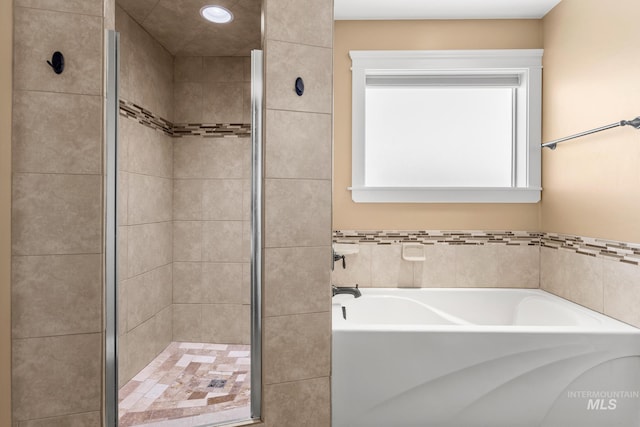 11 W 300 S, Burley, ID 83318 - full bathroom featuring a bath and a stall shower