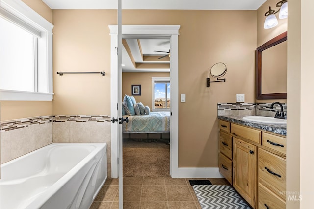 11 W 300 S, Burley, ID 83318 - bathroom with a garden tub, a ceiling fan, vanity, ensuite bath, and tile patterned flooring