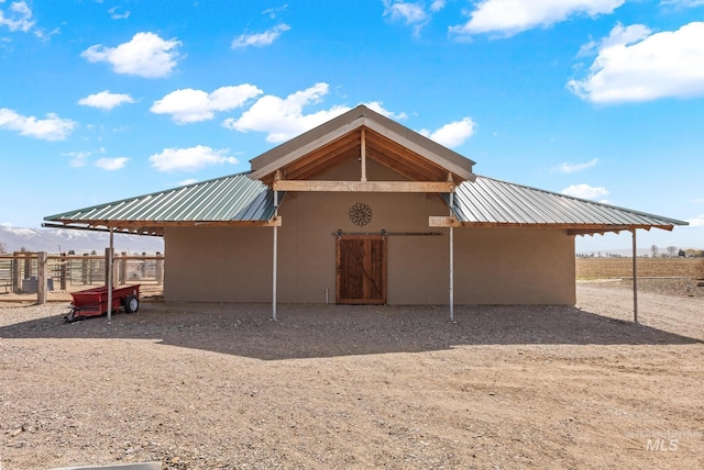 11 W 300 S, Burley, ID 83318 - exterior space featuring stucco siding, an exterior structure, and metal roof