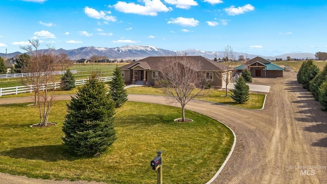11 W 300 S, Burley, ID 83318 - view of home's community featuring curved driveway, a lawn, fence, and a mountain view