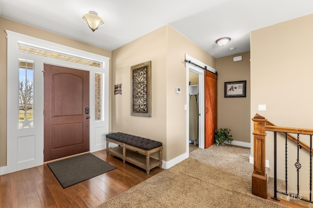 11 W 300 S, Burley, ID 83318 - foyer with hardwood / wood-style flooring, baseboards, and a barn door