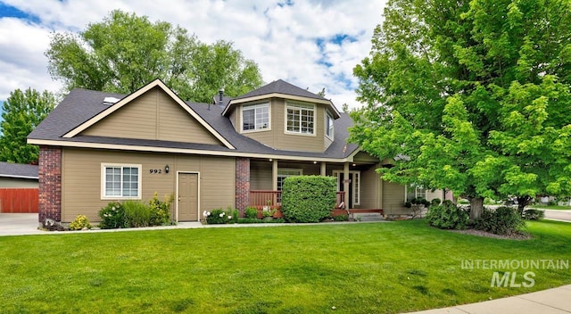 992 N Pinnacle, Eagle, ID 83616 - craftsman house featuring a front lawn, a porch, and brick siding