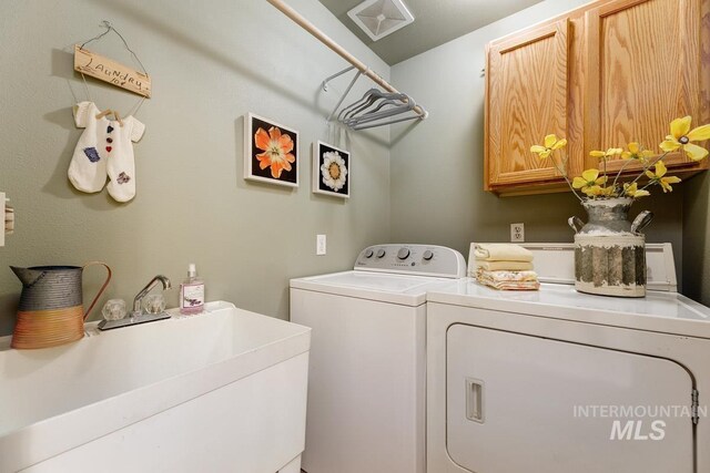992 N Pinnacle, Eagle, ID 83616 - laundry room with cabinet space and washing machine and dryer