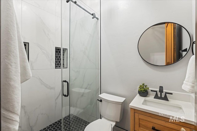 7600 W Ledgerwood Ln, Meridian, ID 83646 - full bath with a marble finish shower, toilet, and vanity