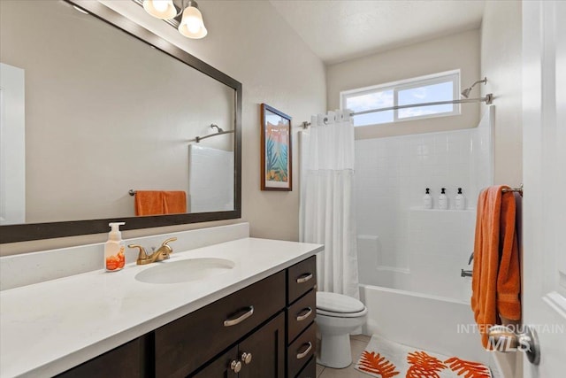 full bath featuring vanity, tile patterned flooring, shower / bath combo with shower curtain, and toilet