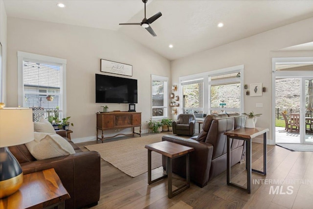 living room featuring recessed lighting, a ceiling fan, lofted ceiling, and wood finished floors