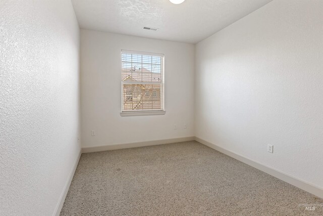 1148 E Winding Creek Dr, Eagle, ID 83616 - carpeted empty room with visible vents and baseboards