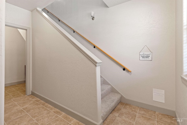 1148 E Winding Creek Dr, Eagle, ID 83616 - stairs with tile patterned floors and baseboards