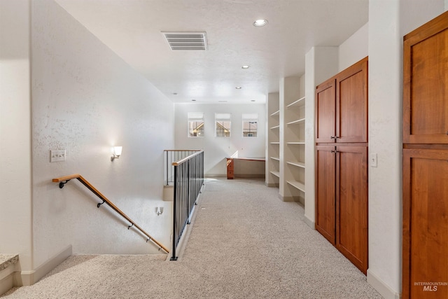 1148 E Winding Creek Dr, Eagle, ID 83616 - corridor with recessed lighting, an upstairs landing, visible vents, baseboards, and carpet floors