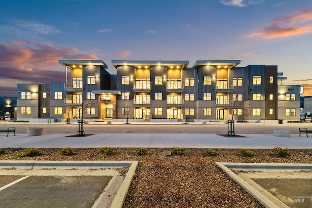 view of property at dusk