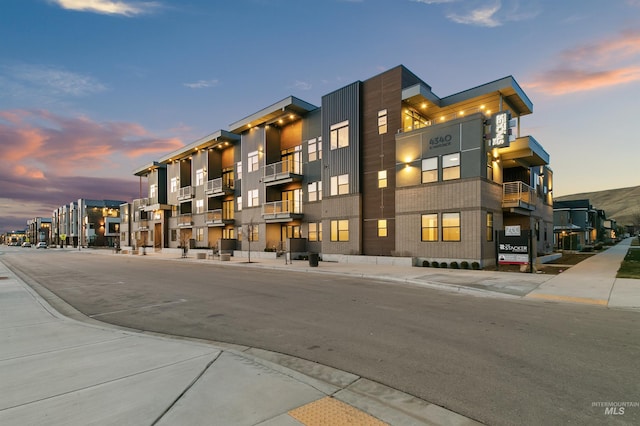 view of property at dusk