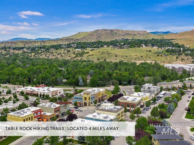 drone / aerial view featuring a mountain view