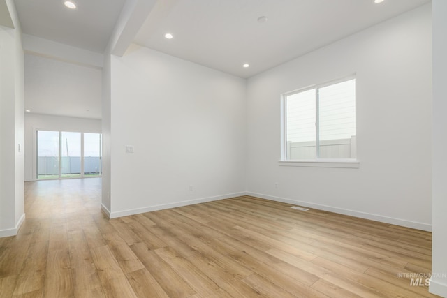 unfurnished room featuring light hardwood / wood-style flooring