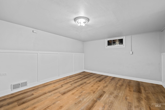 bonus room featuring hardwood / wood-style floors