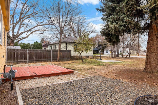 view of yard featuring a wooden deck