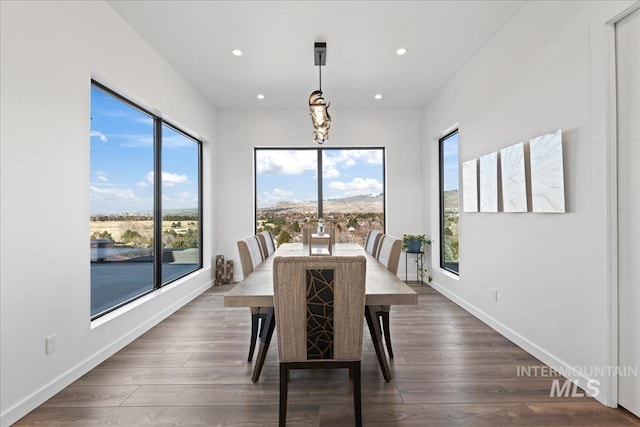 3492 E Heartleaf Dr, Boise, ID 83716 - dining space with recessed lighting, baseboards, and wood finished floors