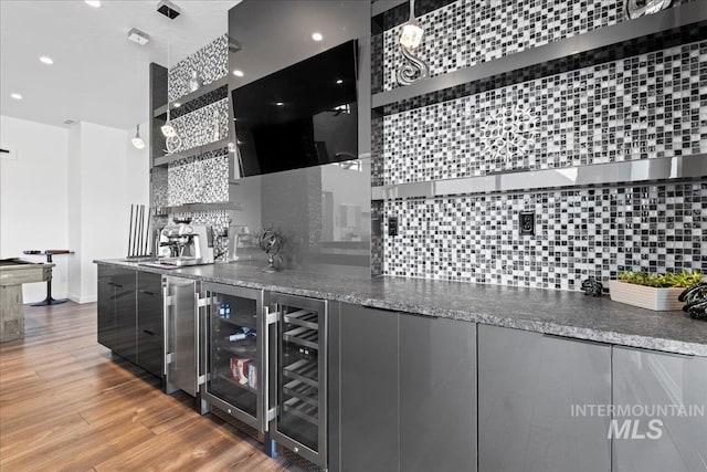 3492 E Heartleaf Dr, Boise, ID 83716 - kitchen featuring backsplash, beverage cooler, wood finished floors, modern cabinets, and open shelves