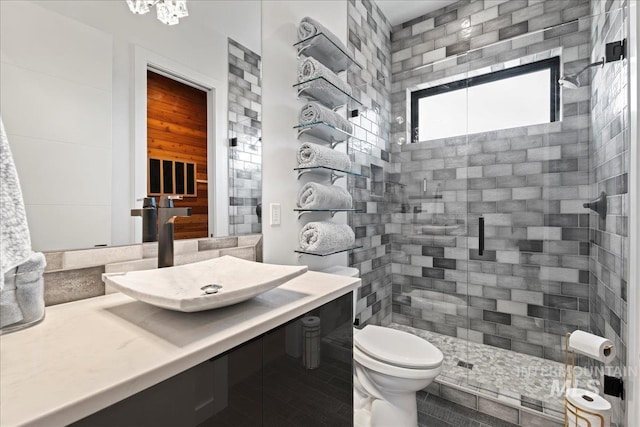 3492 E Heartleaf Dr, Boise, ID 83716 - full bath featuring a stall shower, toilet, and vanity