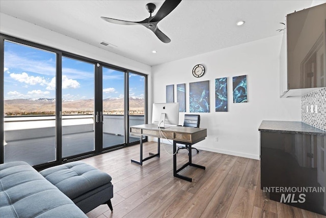 3492 E Heartleaf Dr, Boise, ID 83716 - home office featuring visible vents, baseboards, recessed lighting, wood finished floors, and a ceiling fan