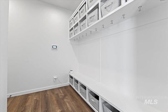 3492 E Heartleaf Dr, Boise, ID 83716 - mudroom featuring baseboards and dark wood-style floors