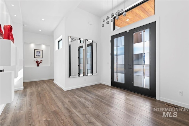 3492 E Heartleaf Dr, Boise, ID 83716 - entrance foyer with recessed lighting, french doors, wood-type flooring, and baseboards