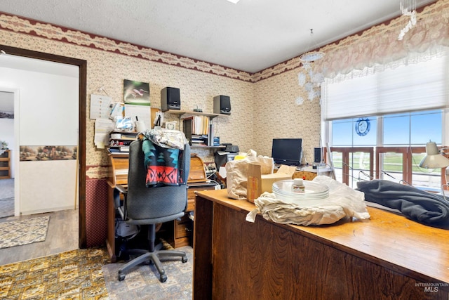 office area featuring a textured ceiling and wood-type flooring