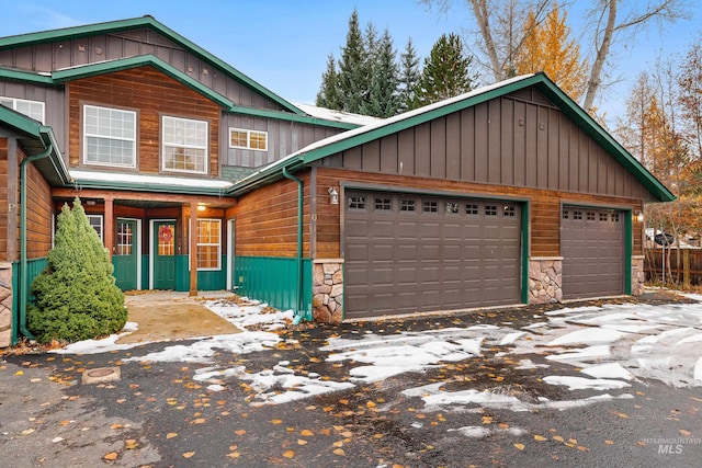 view of front of property with a garage